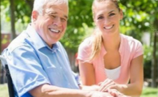 caregiver and elderly man