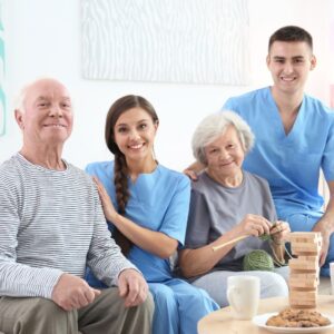 caregivers with elderly couple