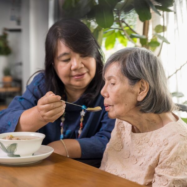 woman taking care of her mom